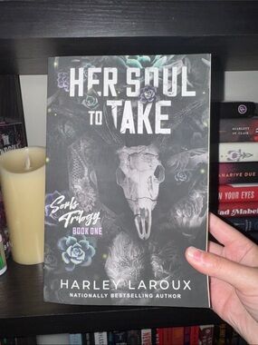 Her Soul to Take by Harley Laroux paperback